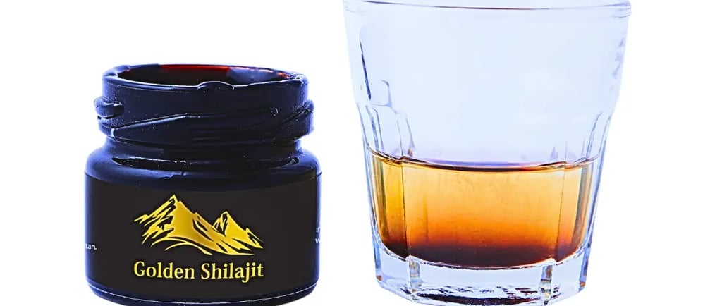 a spoon of golden shilajit resin 