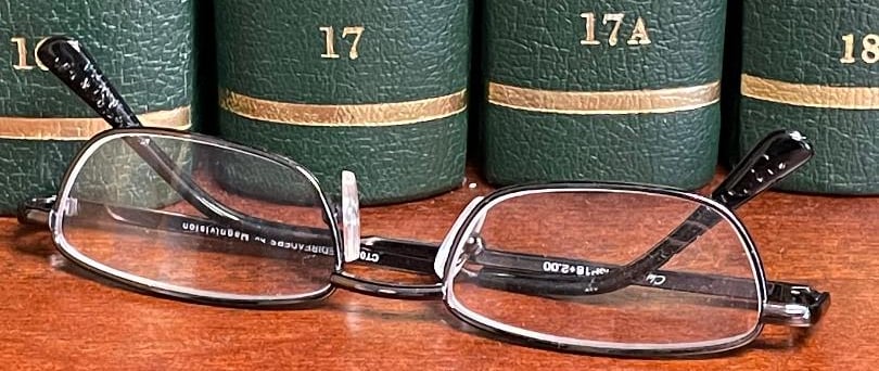 a pair of glasses on a table