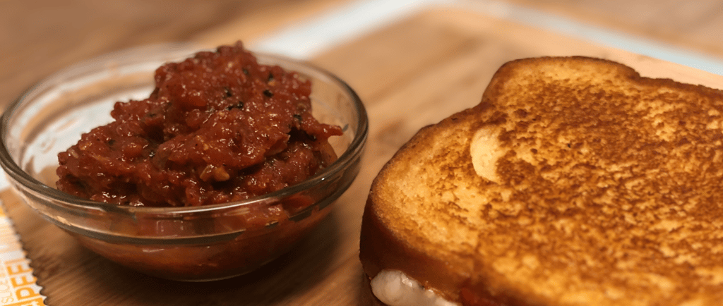 smokey roasted garlic marinara beside a pepperoni grilled cheese