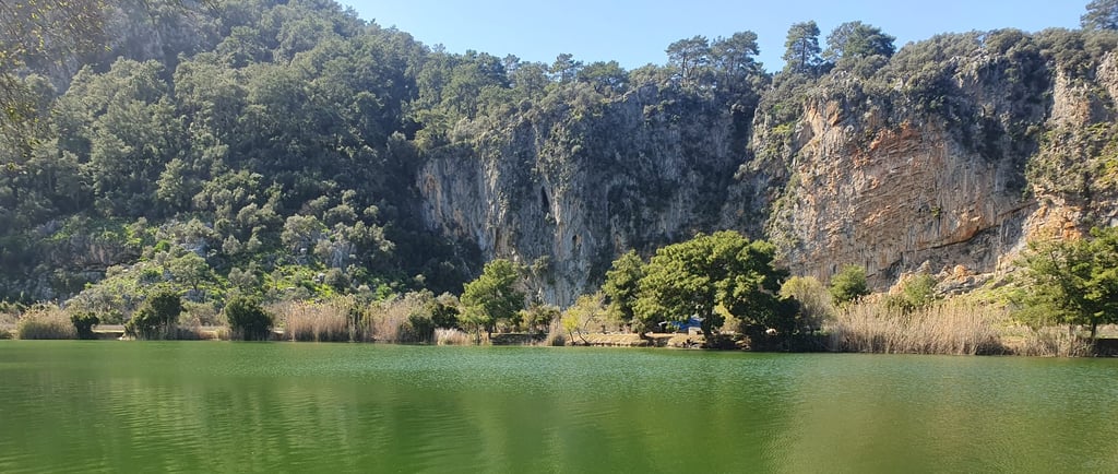 Dalyan river with a mountain in the background