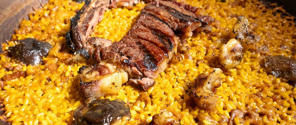 a large pan of food with meat and vegetables