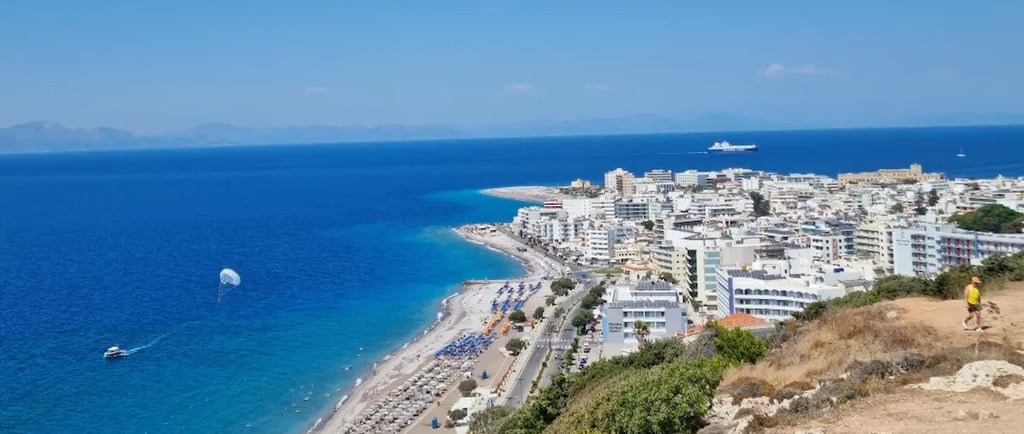 a view of a beach with a view of the ocean