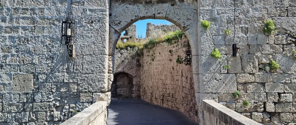a stone wall with a clock on it