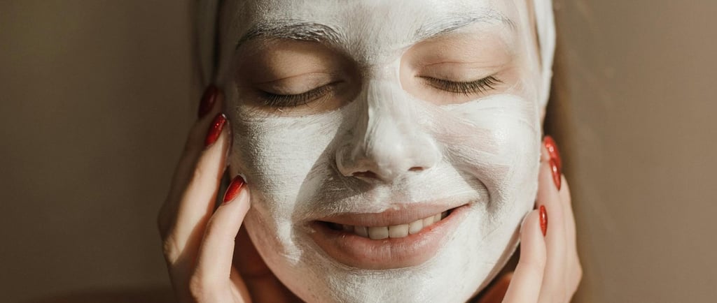 a woman with a white face mask on her face