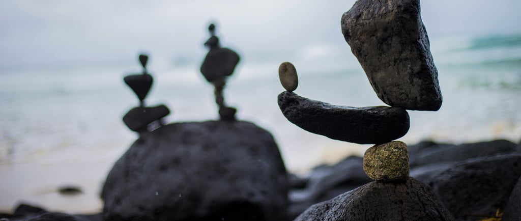 a stack of rocks sitting on top of a pile of rocks