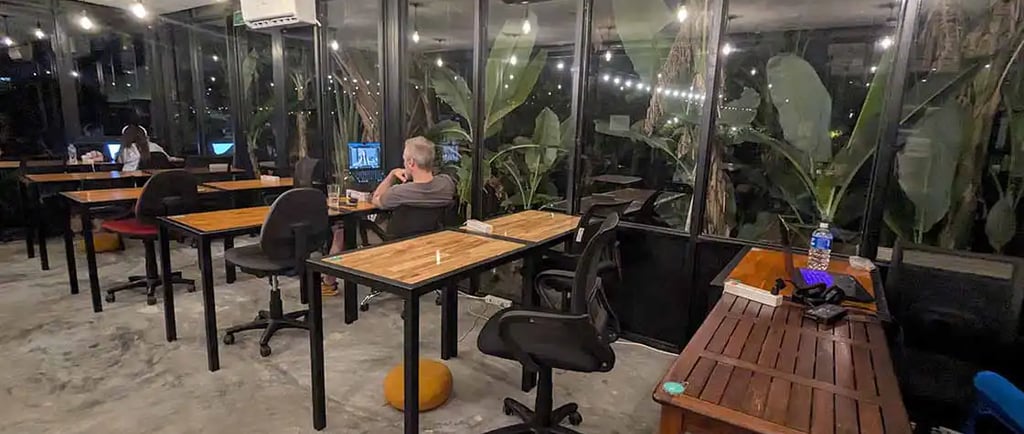 Coworking space with digital nomads working at night in Hoi An, Vietnam