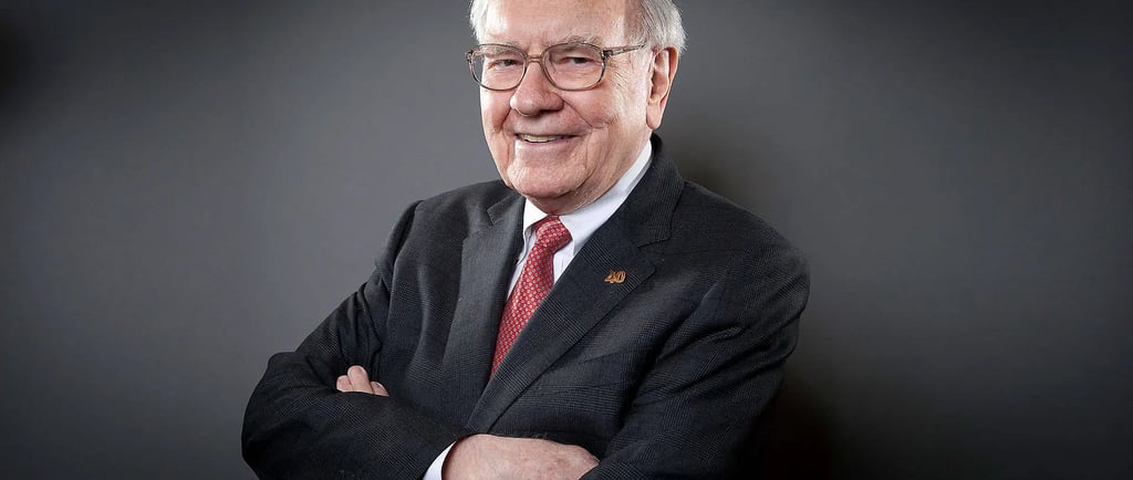 a man in a suit and tie smiling