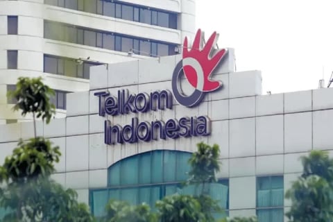 a building with a large sign that says telkom indonesia