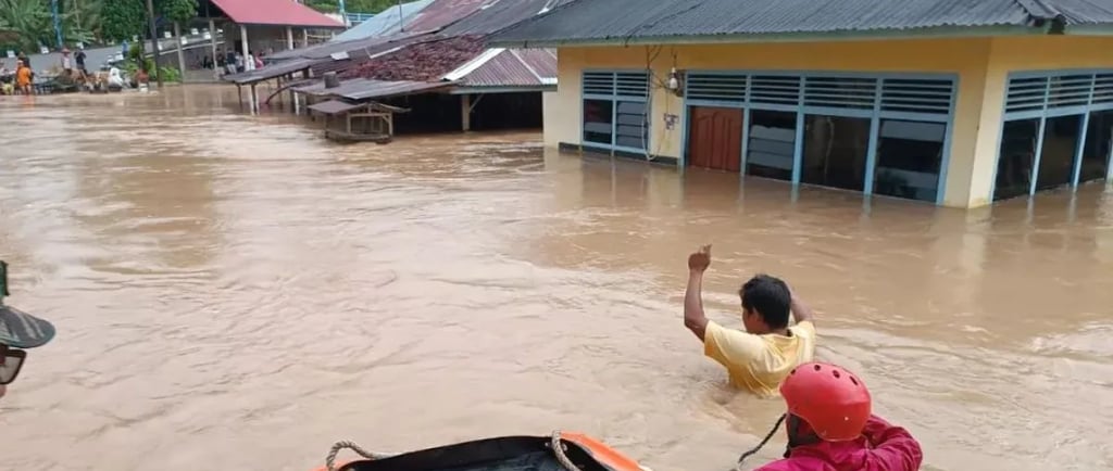 a man in a boat in the water