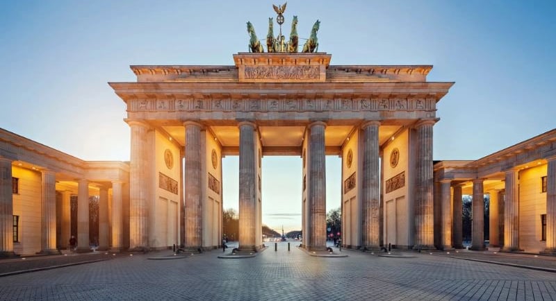 a large building with a large arch in the middle of it