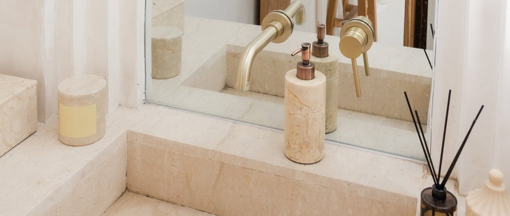 Basin built into a plastered surround.