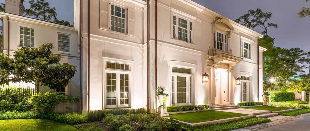 a large house with a driveway and a driveway