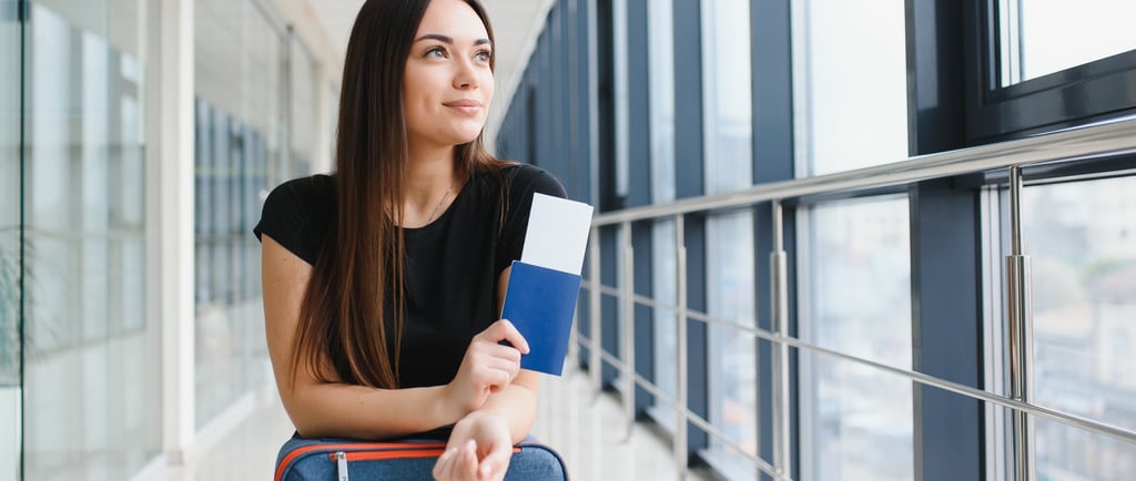 a woman holding a passport, airline ticket and dominican eticket