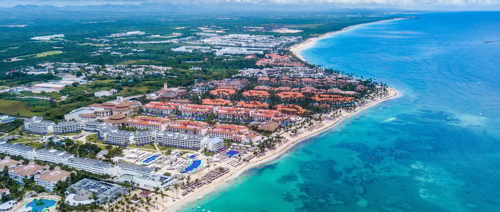Aerial view of Bávaro beach resorts and turquoise sea in Punta Cana, Dominican Republic