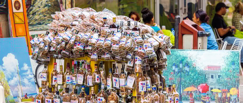 Mamajuana bottles and Dominican art for sale in the streets of Santo Domingo’s Colonial Zone