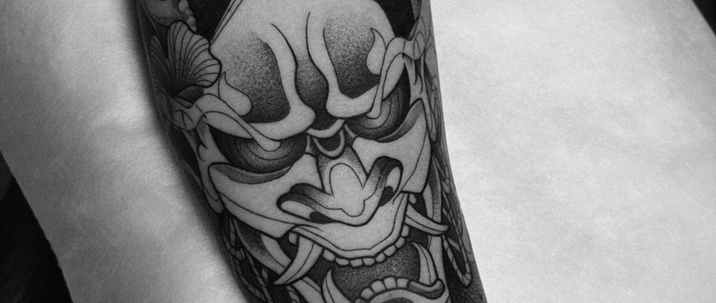 a tattoo style tattoo on a forearm of a man's arm