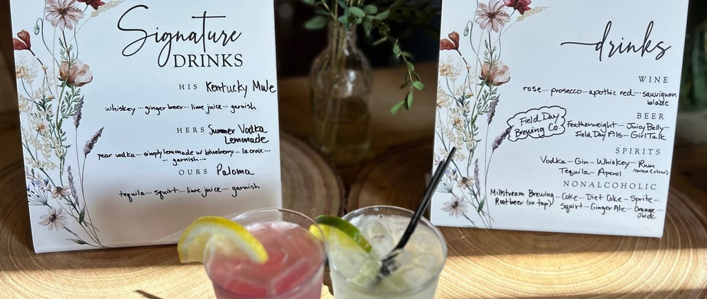 a table with a drink and a menu