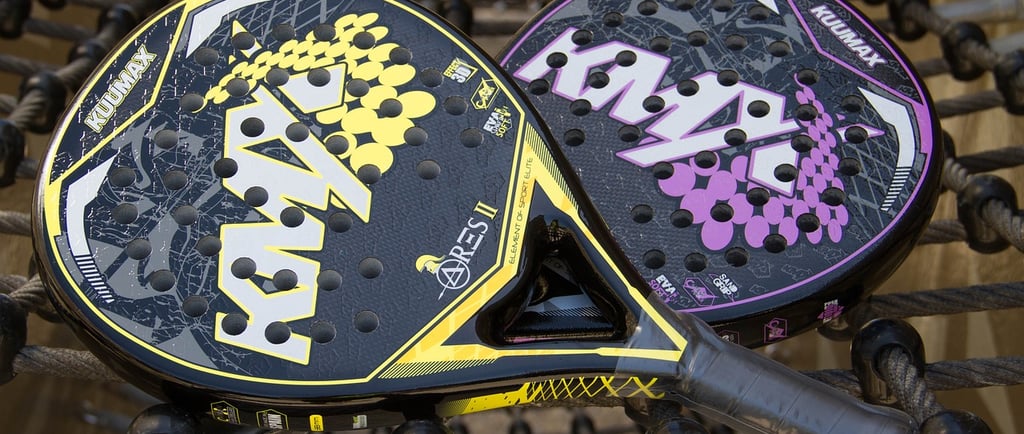 2 rackets laying on a net