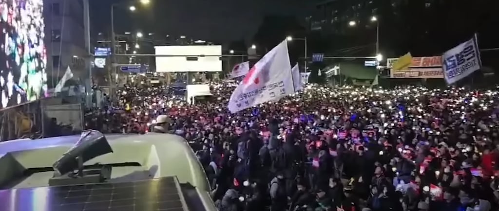 Discover the shocking political crisis in South Korea—martial law, mass protests, and President Yoon