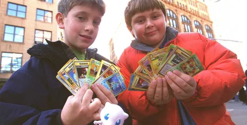 two boys holding pokemon go - go - go - go - go - go -