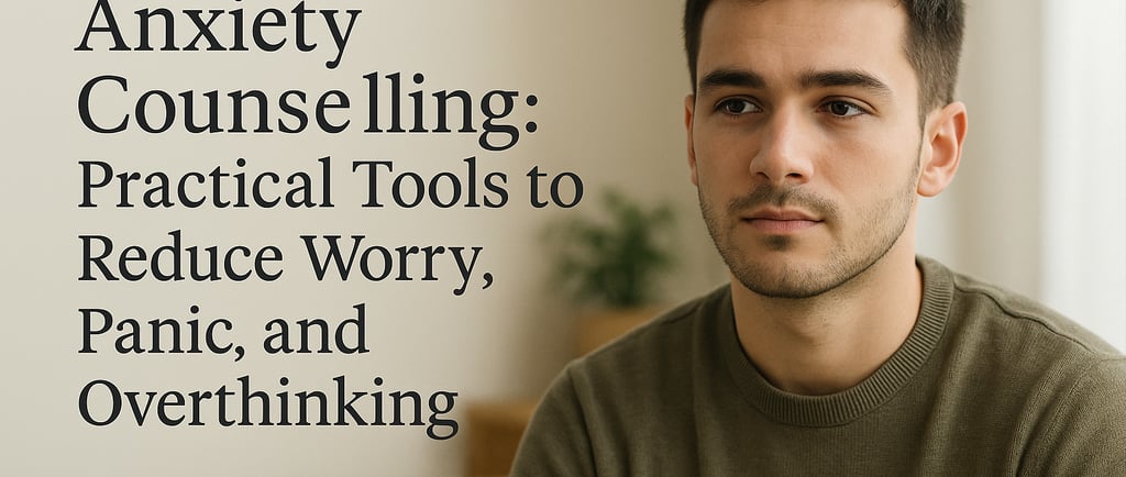 a thoughtful young man in his 20s, seated indoors in soft natural light