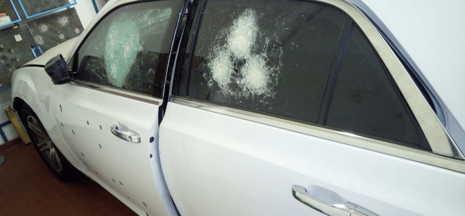 Armored Glass with Bullet Impacts – Bulletproof Vehicle Security