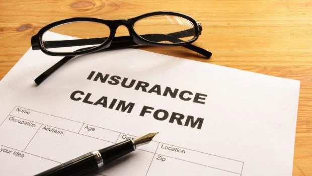 Insurance claim form on desk illustrating common mistakes homeowners make when lodging an insurance claim