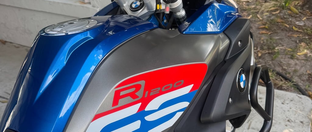 Service R Us USA technician programming a BMW motorcycle key fob in Davie, FL