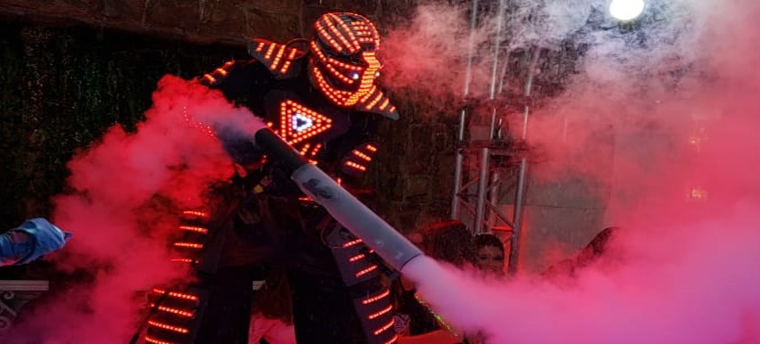 a man in a costume with a giant light up