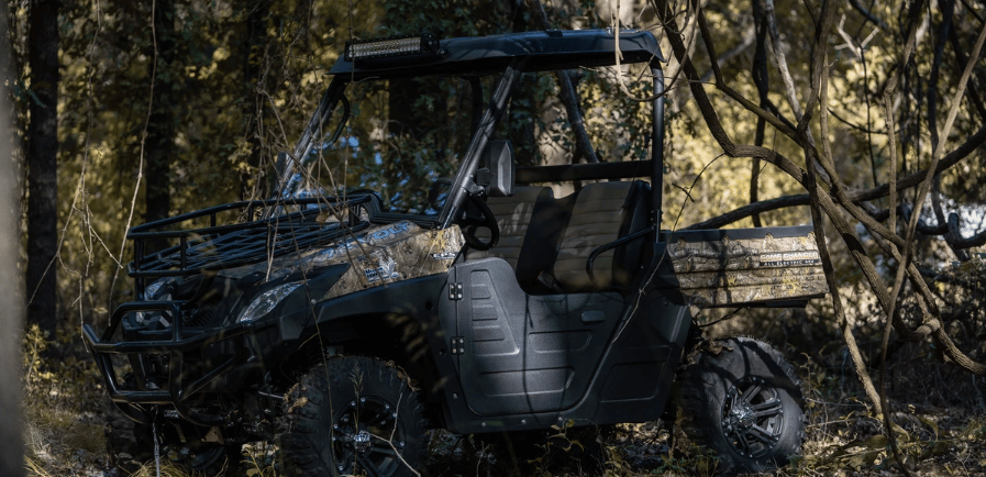 camo huntve utv hidden in bushes