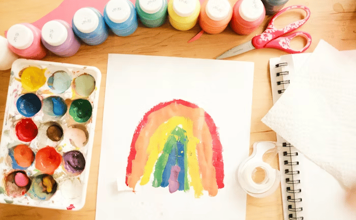 A child creates beautiful artwork at home.