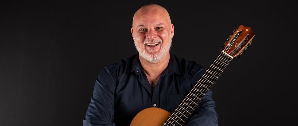 a man with a guitar and a guitar