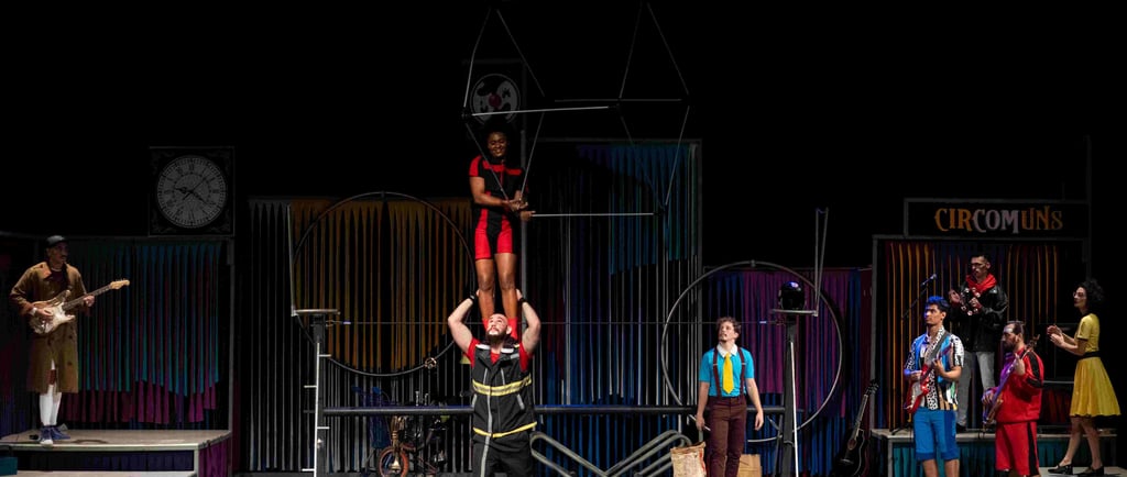 a circus act of acrobatic circus performers performing on stage