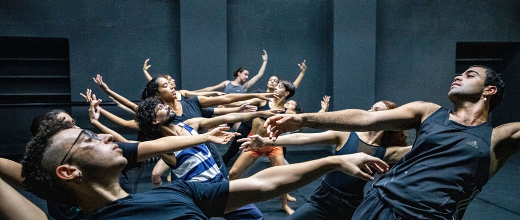 a group of dancers performing a dance routine