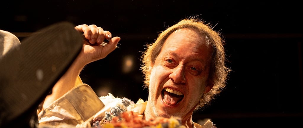 a man holding a knife and knife in his hand