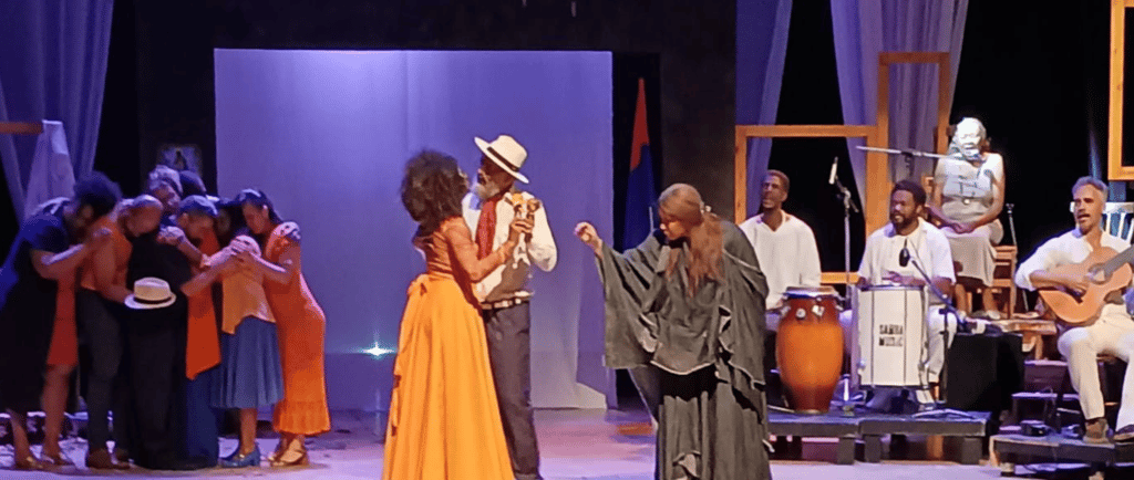 a man and woman in a stage setting