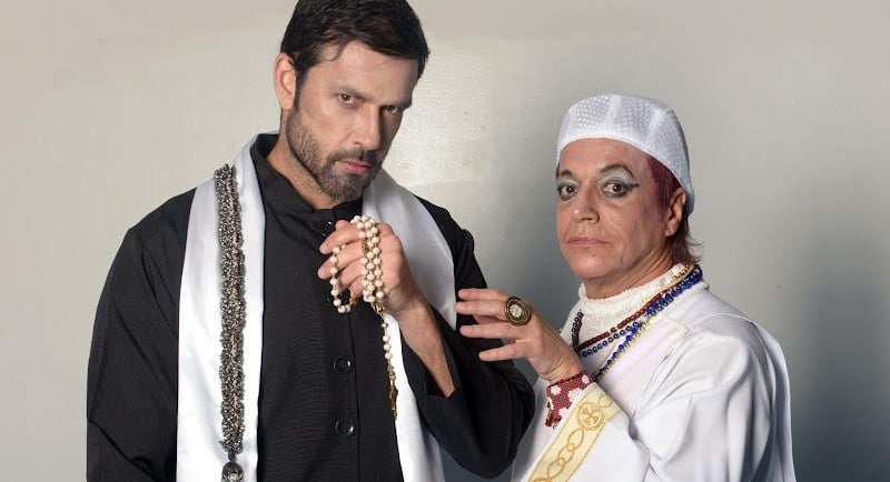 a man and woman dressed in traditional clothing