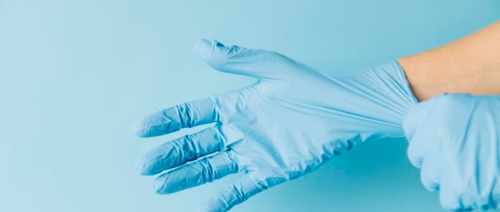 a person wearing gloves and gloves with a glove on their hands