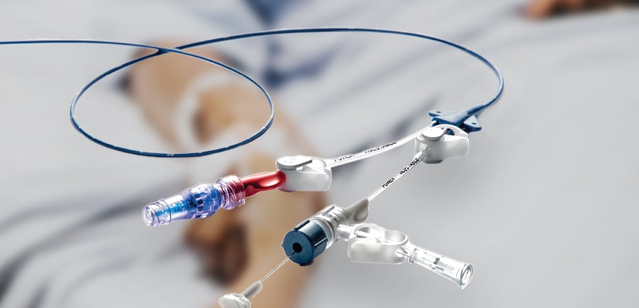 a person laying in bed with a tube attached to a cord