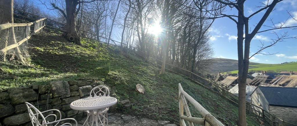 a beautiful garden overlooking west lulworth village