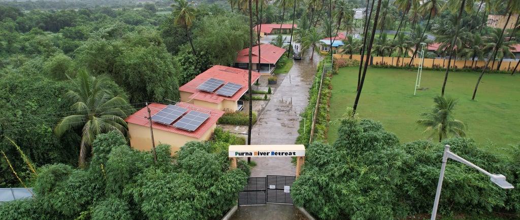 best resort for one day family picnic near surat shows entry of purna river retreat with cottages