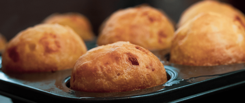 a tray of baked goods and pastries