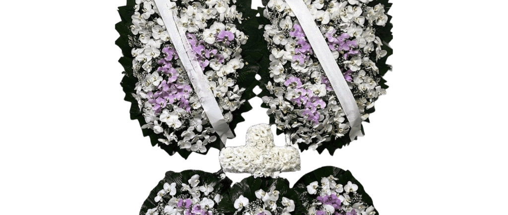 imagem mostra como homenagear um ente falecido com coroas de flores consolare