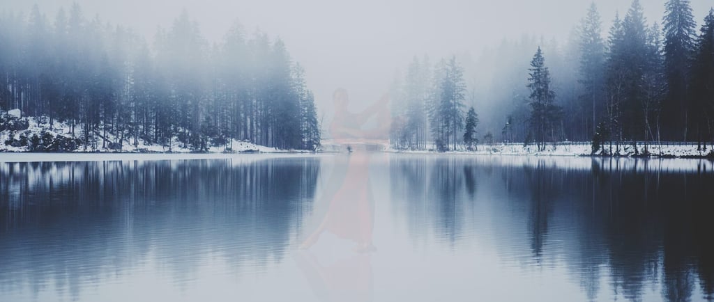 Ghostly figures dance on the surface of a lake