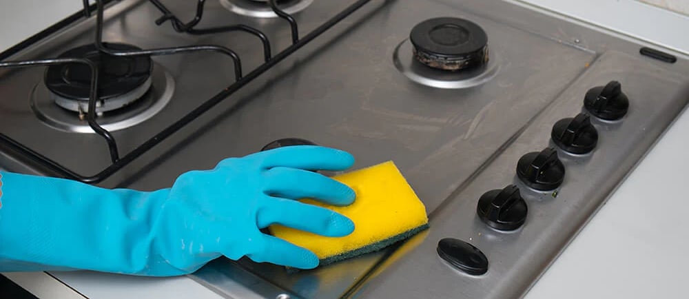 wiping gas oven