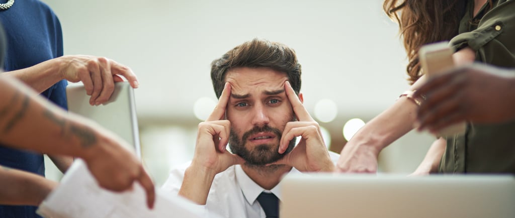 Frustrated IT manager overwhelmed by scaling challenges
