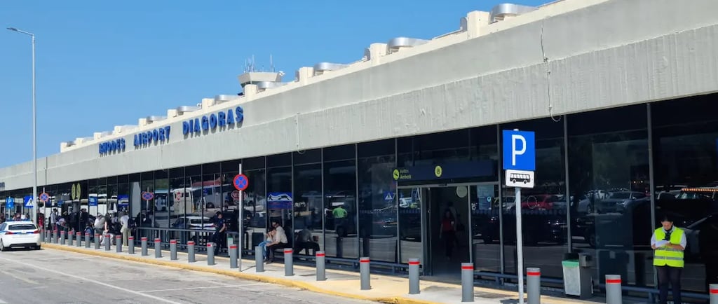 The exterior terminal building of Rhodes Airport Diagoras in Greece on a sunny day.