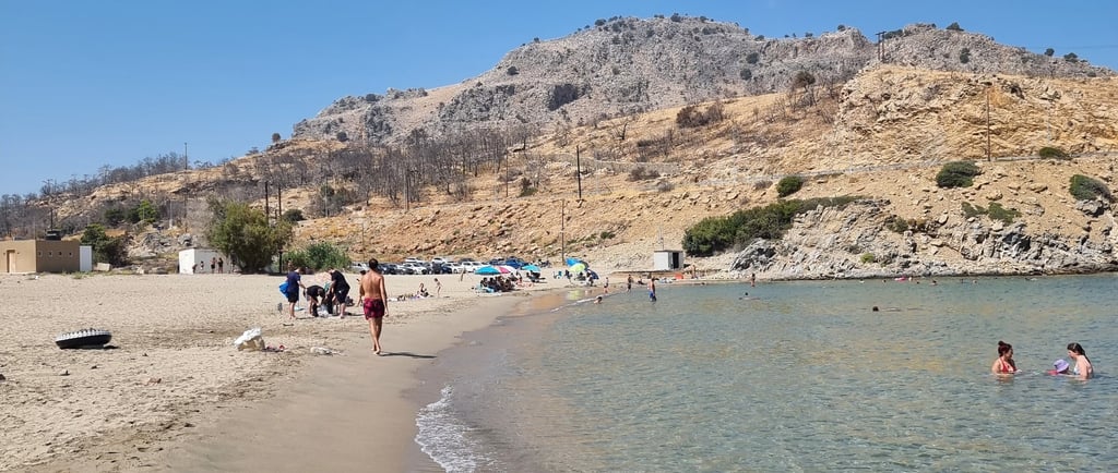 a beach with people on the beach