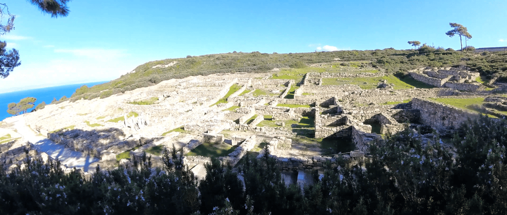a view from a mountain with a view on Ancient Kamiros in Rhodes Greece