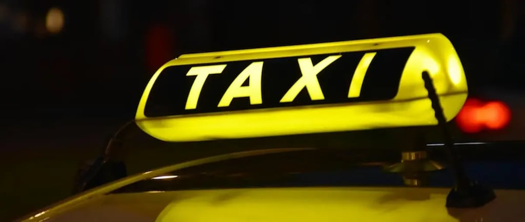 yellow Taxi light sign
